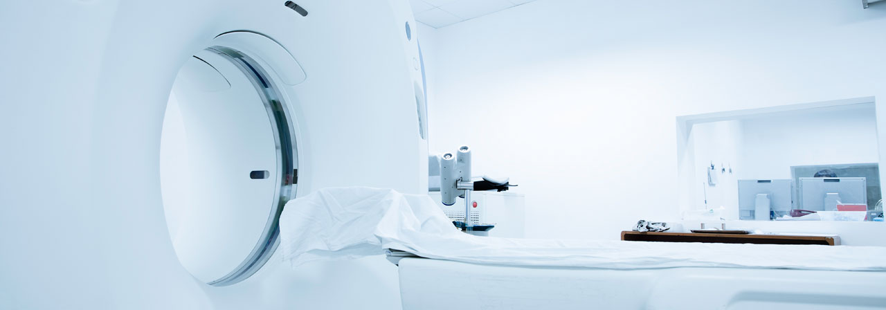 patient lays in MRI machine