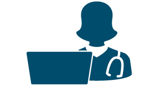 Silhouette of healthcare professional standing in front of a laptop