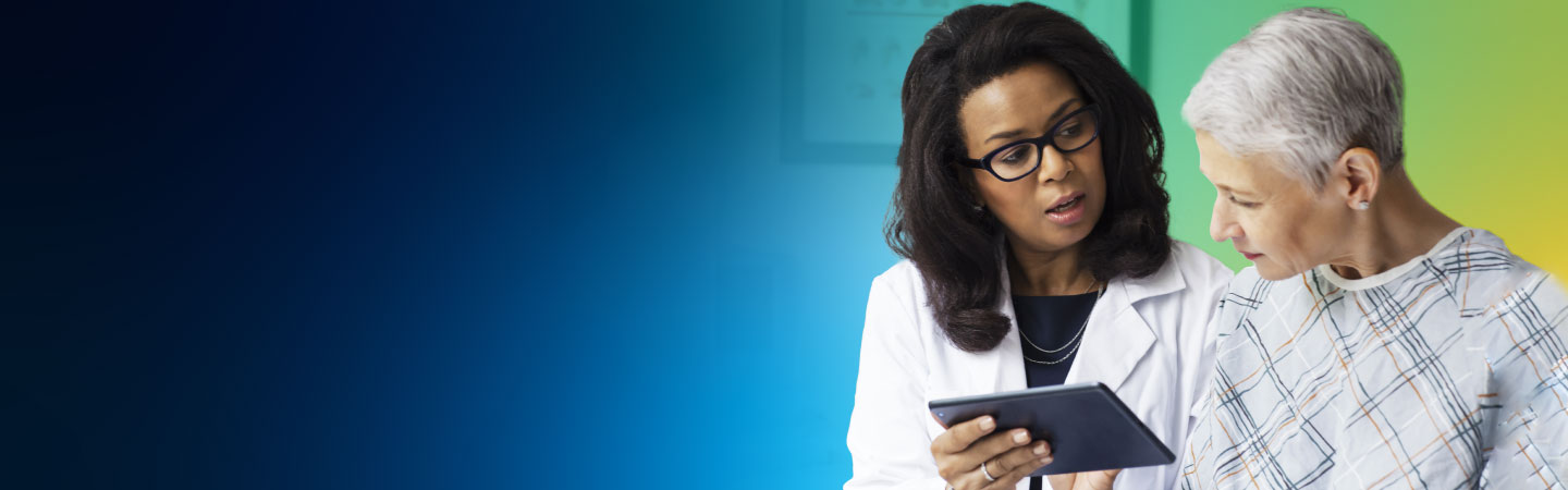 Female doctor discussing heart failure symptoms with a female patient