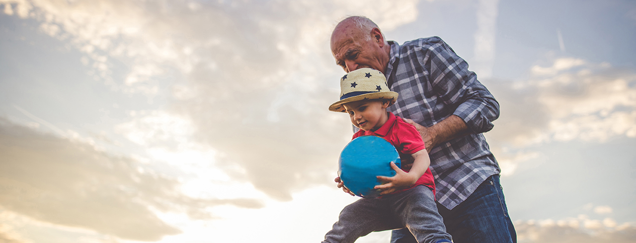 senior and child playing together